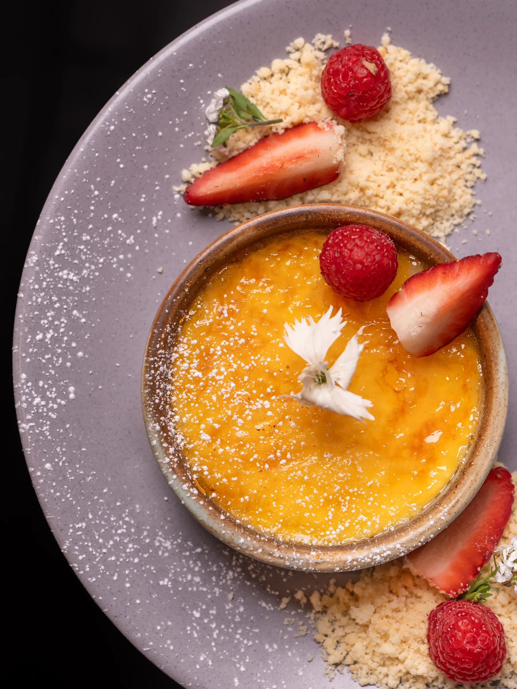 Crème brûlée with strawberries — Sage Yellowfin South Bank Brisbane