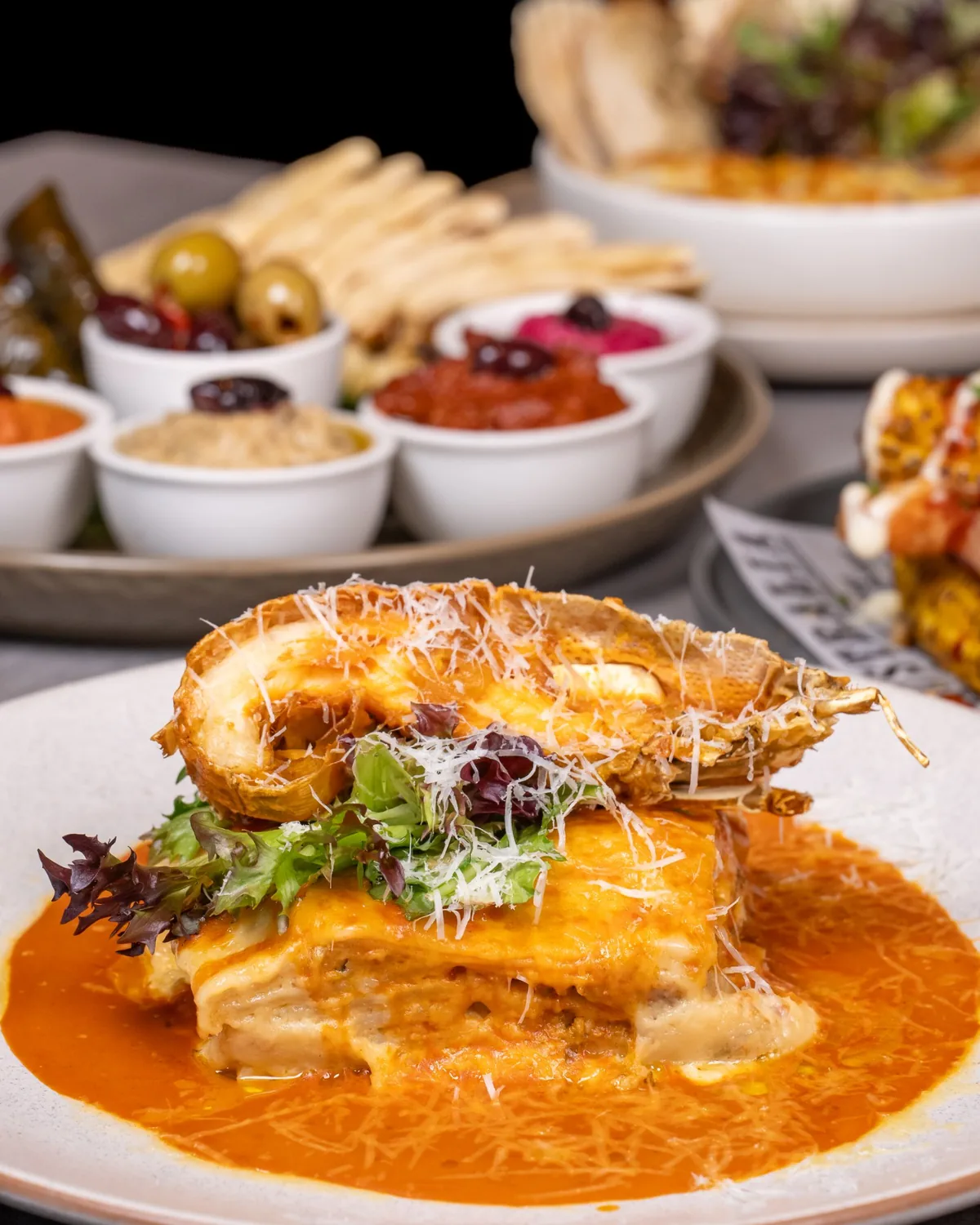 Mediterranean dips platter with grilled flatbread