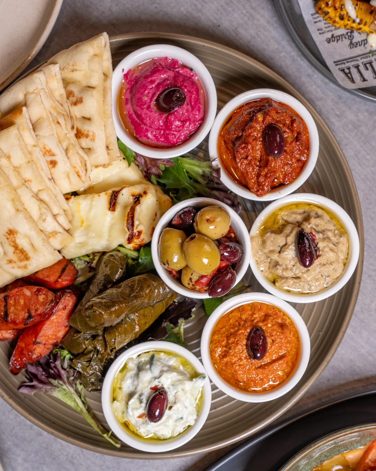 Chimichurri lamb skewers with romesco sauce